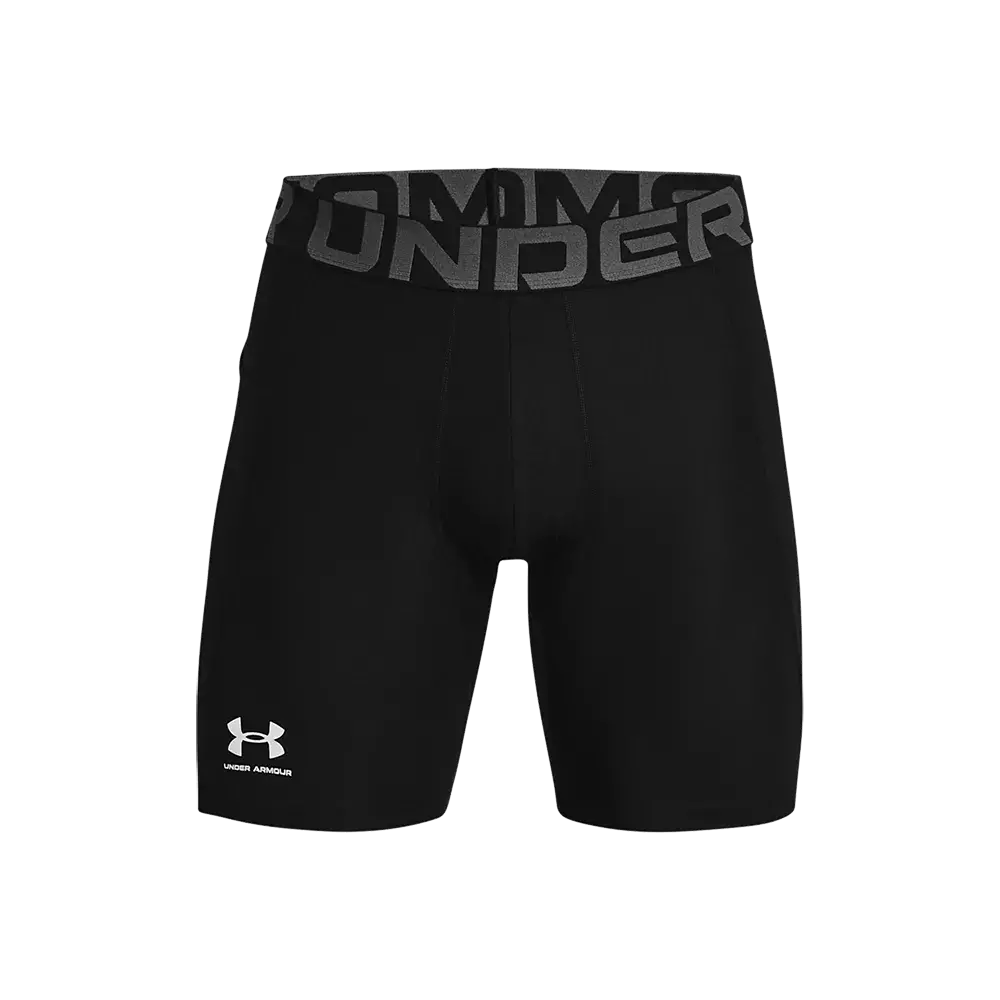 Billedet viser et par sorte kompressionsshorts fra Under Armour. Shortsen har et tæt, elastisk fit med flade syninger for bevægelsesfrihed og komfort. Et bredt elastik-liv med tydeligt 'Under Armour'-tryk sikrer god pasform, mens det lille logo på låret giver et sporty finish. Designet er enkelt og funktionelt, velegnet til træning, løb og højintensitetsaktiviteter.