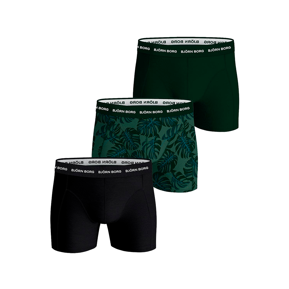 Billedet viser et sæt af tre herreboxers fra Björn Borg i mørke, grønne toner. Et par er ensfarvet sort, et par dybgrønt og et med bladprint i grønne nuancer. Alle har en elastisk linning med det hvide Björn Borg-logo, tætsiddende pasform og flade syninger. Designet fremstår moderne og sporty, velegnet til hverdag og fritid med fokus på komfort og holdbarhed.