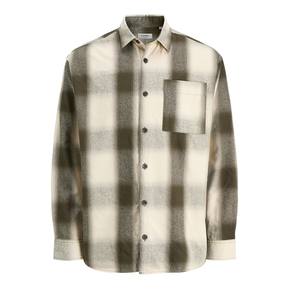 Skjorten er en afslappet, langærmet button-down i blødt, flannel-agtigt stof med en storternet tern i afdæmpede creme- og olivengrønne nuancer. Den har mørke knapper ned foran, en brystlomme og en let oversize pasform, som gør den ideel til lag-på-lag i efterårs- og vintermånederne. Et alsidigt, tidløst stykke til både hverdag og weekend.