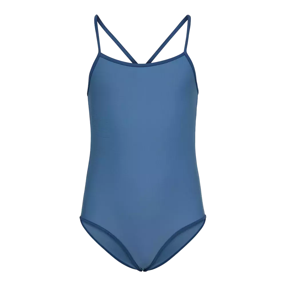 En enkel, ensfarvet blå badedragt i klassisk tankini‑snit med smalle skulderstropper, der krydser let bagpå. Stoffet virker glat og elastisk med mat finish, og syninger langs kanter giver et rent, minimalistisk udtryk. Badedragten har moderat udskæring ved benene og en lige halsudskæring, hvilket gør den velegnet til både svømning og afslappet strandbrug for dem, der foretrækker enkelhed.