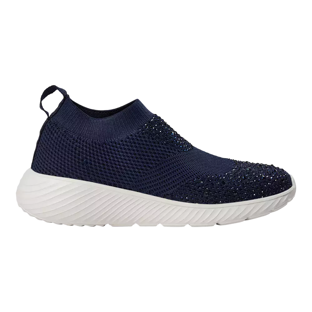 En elegant mørkeblå slip-on-sneaker med strikket, soklignende overdel og små glimtende sten som dekor. Skoen har elastisk åbning og en praktisk trækflap ved hælen for nem påtagning. Den markerede, hvide mellemsål er tyk og bølget, hvilket giver både signaturstil og god dæmpning. Designet kombinerer afslappet komfort med et feminint præg og passer til hverdag og fritid.