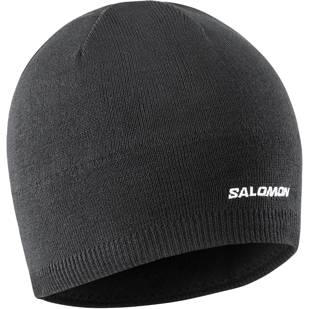En enkel, mørkegrå/anthracit strikket hue fra Salomon med diskret hvidt logo på kanten. Den tætsiddende beanie har en ribbet kant og ser ud til at være foret med blød fleece indvendigt, hvilket gør den varm og behagelig til kolde dage. Stilren og funktionel, velegnet til skiløb, vandreture eller hverdag, hvor man ønsker både varme og et minimalistisk udseende.
