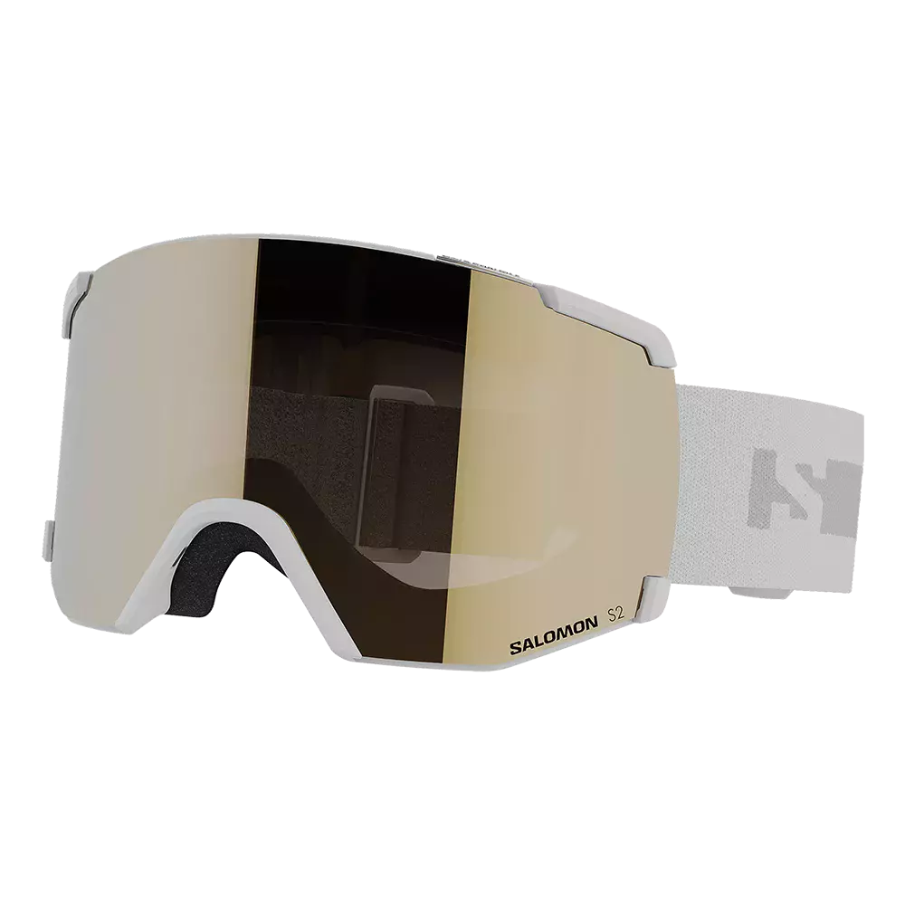 Disse Salomon S2 skibriller har et stilrent, næsten rammeløst design med en gylden spejllinse, der giver et moderne look og reducerer blænding. Hvidt stel og elastisk, mønstret rem sikrer god pasform over hjelm. Indvendigt blødt skum mod huden for komfort og tæt forsegling mod sne og vind. Ideelle til alpine aktiviteter, hvor både stil og funktionalitet vægtes.