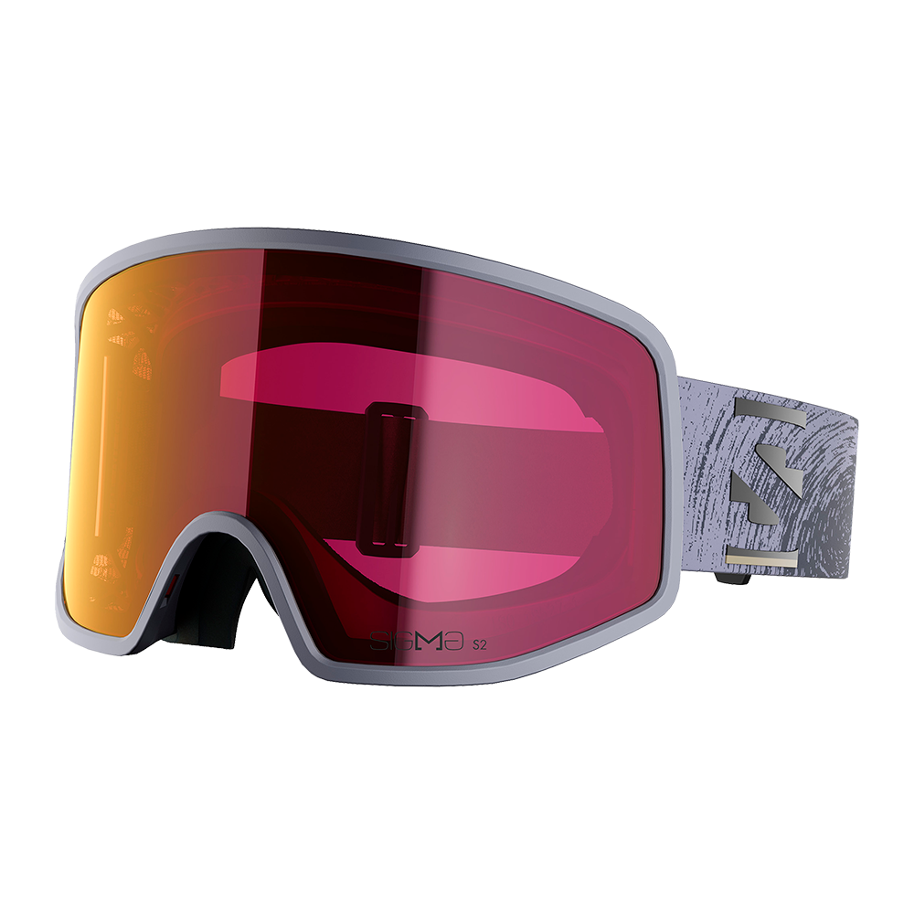 Et par moderne skibriller med bred, kurvet linse i spejleffekt, der går fra orange til pink. Den lysegrå ramme er minimalistisk og omfavner en stor, næsten kantløs front, mens det mønstrede elastikstrop med diskrete udskæringer sikrer god pasform. Indersiden har blød skumforing til komfort og tætning mod vind, velegnet til alpine forhold og intens aktivitet i sneen.