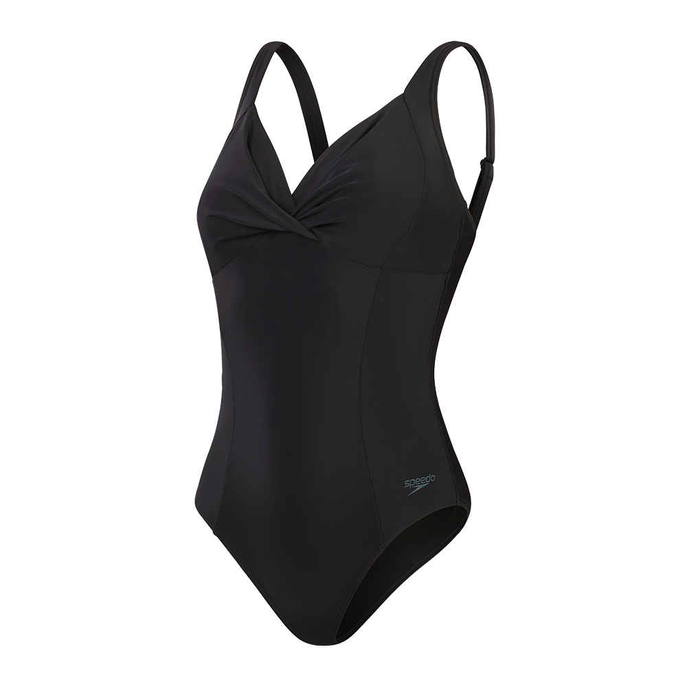 En elegant sort badedragt i enkelt, tidløst design med et let tvistdetalje foran, som fremhæver brystpartiet. Smalle, justerbare stropper giver god pasform og støtte, mens det glatte materiale sikrer komfort i vandet og hurtigttørrende finish. Badedragten har moderat benudskæring og diskret logo ved hoften, velegnet til både træning og afslappet svømning.