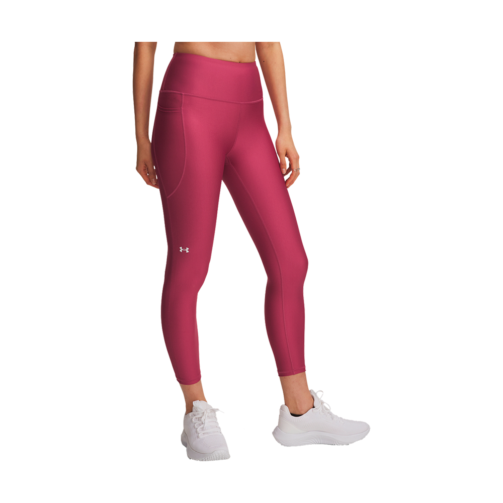 Et par højtaljede træningstights i dyb pink ses på billedet, med tætsiddende pasform og ankellængde. Tightsene har en synlig sidelomme og et lille logo på låret. Kombineret med hvide træningssko giver outfittet et sporty og moderne udtryk, velegnet til løb, fitness eller hverdagsaktivitet. Stoffet fremstår glat og elastisk, designet til bevægelsesfrihed og komfort.