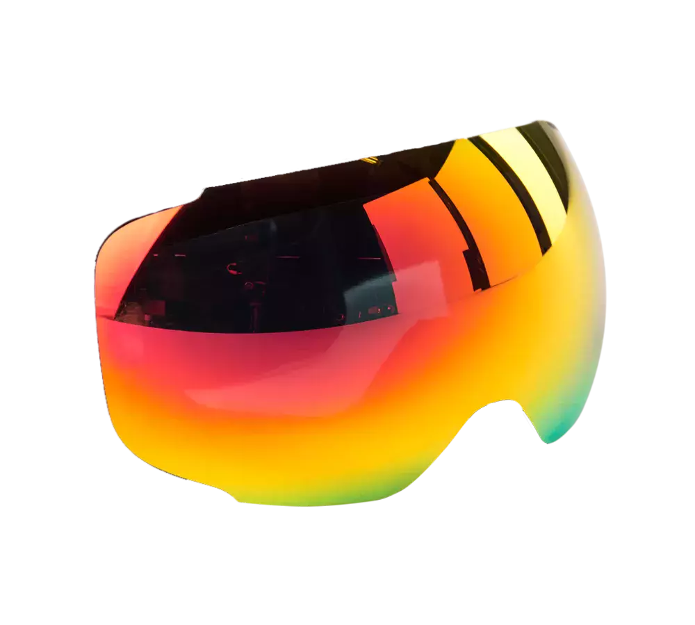 Detaljeret billede af en spejlet, buet linse til skibriller med en intens farvegradient fra rød og orange til gul og grøn. Den aerodynamiske, næsten rammeløse form giver et bredt synsfelt og moderne udtryk. Overfladen er højglans og reflekterer omgivelserne, og linsetypen antyder avancerede behandlinger som anti-dug og UV-beskyttelse, designet til aktive vintersportsudøvere.