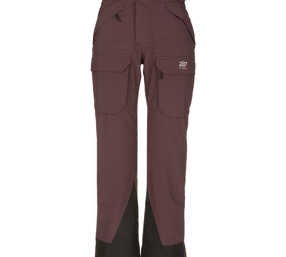 Disse praktiske skibukser i dyb bordeaux viser et robust, teknisk design med store cargolommer på lårene, to-knaps lukning og skrå lommer ved hofterne. Buksebenene er forstærkede med sorte paneler ved anklerne for ekstra holdbarhed, og taljen har justerbare detaljer for bedre pasform. Materialet fremstår vind- og vandafvisende, ideelt til udendørs aktiviteter og koldt vejr.
