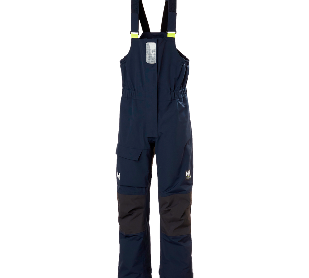 Et par mørkeblå overalls med seler, designet til udendørs brug. Bukserne har justerbare seler, elastisk talje, forstærkede sorte knæpartier og en stor cargolomme på låret. En reflekterende lap på brystet og små neon-gule detaljer giver ekstra synlighed. Tidløst, funktionelt snit med praktiske lommer og slidstærke materialer gør dem velegnede til arbejde, sejlads eller aktive udendørsaktiviteter.