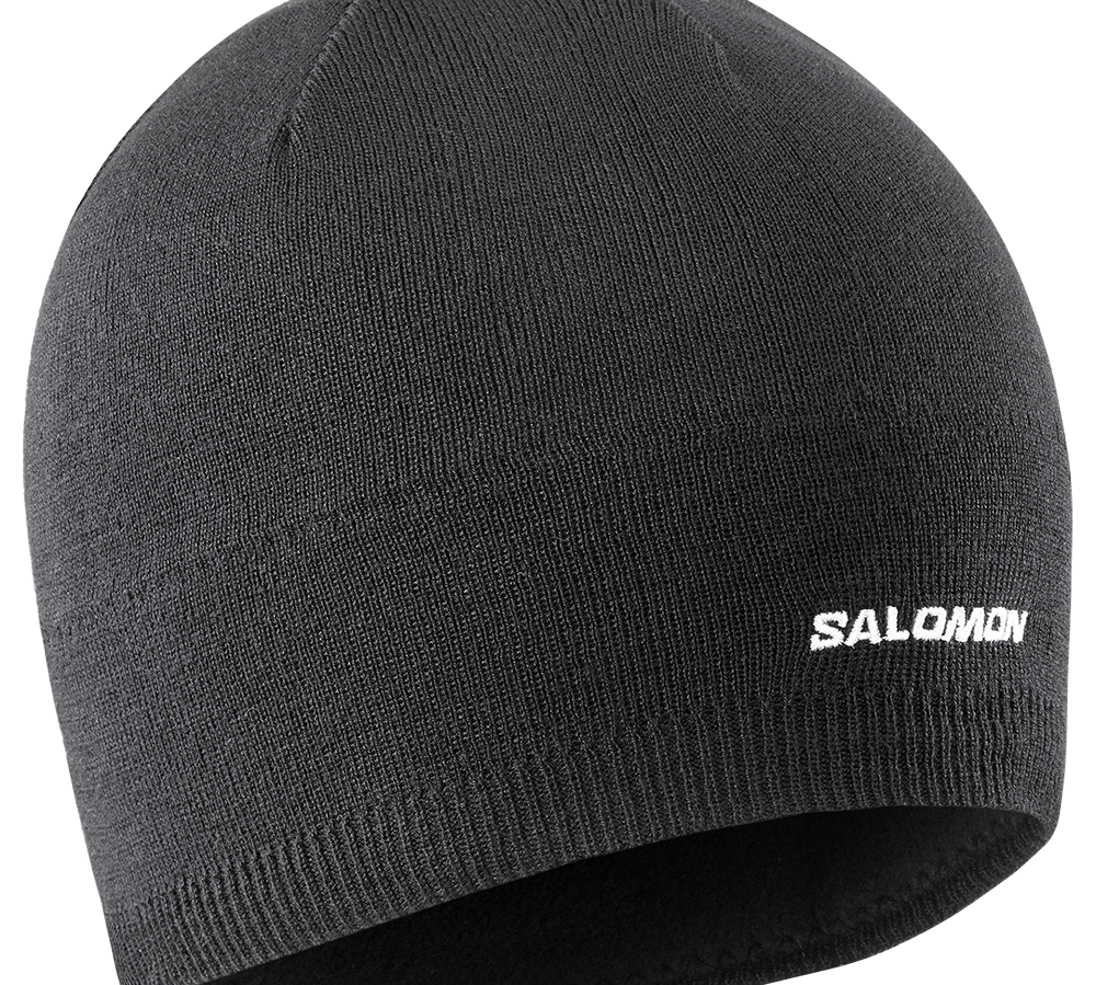anthracit strikket hue fra Salomon med diskret hvidt logo på kanten. Den tætsiddende beanie har en ribbet kant og ser ud til at være foret med blød fleece indvendigt, hvilket gør den varm og behagelig til kolde dage. Stilren og funktionel, velegnet til skiløb, vandreture eller hverdag, hvor man ønsker både varme og et minimalistisk udseende.