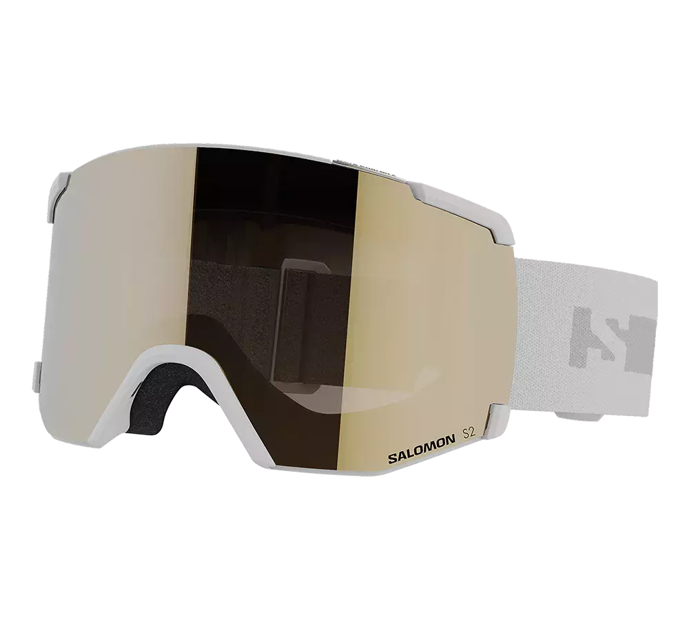 Disse Salomon S2 skibriller har et stilrent, næsten rammeløst design med en gylden spejllinse, der giver et moderne look og reducerer blænding. Hvidt stel og elastisk, mønstret rem sikrer god pasform over hjelm. Indvendigt blødt skum mod huden for komfort og tæt forsegling mod sne og vind. Ideelle til alpine aktiviteter, hvor både stil og funktionalitet vægtes.